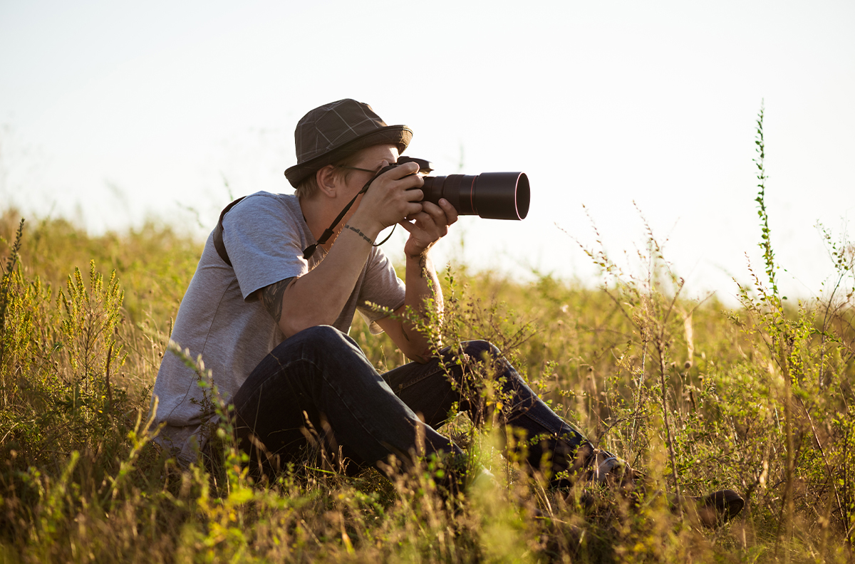Man sitting with Camera